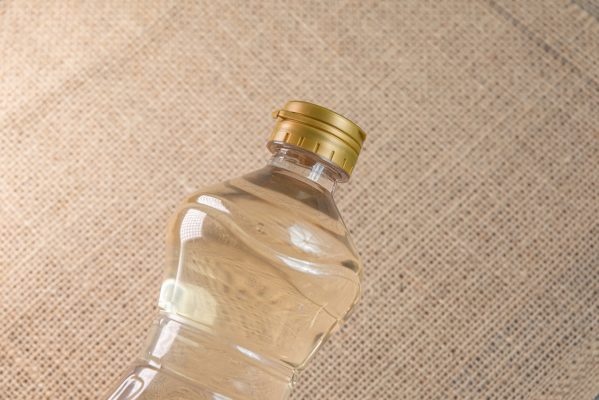 container vinegar brown background -
