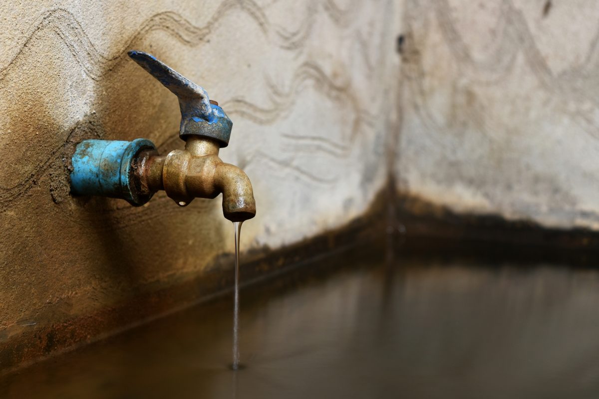 water drop from old faucet -