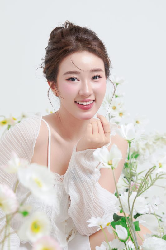 woman white dress with flowers -