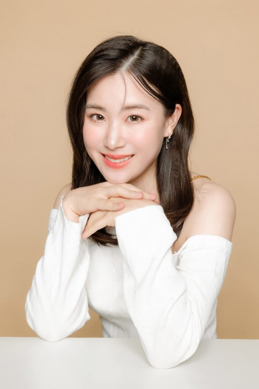 young asian beauty woman short hair with korean makeup style face perfect clear fresh skin isolated beige background facial treatment cosmetology plastic surgery -